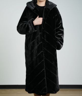 A Synthetic Fur Coat With Diamond Patterns